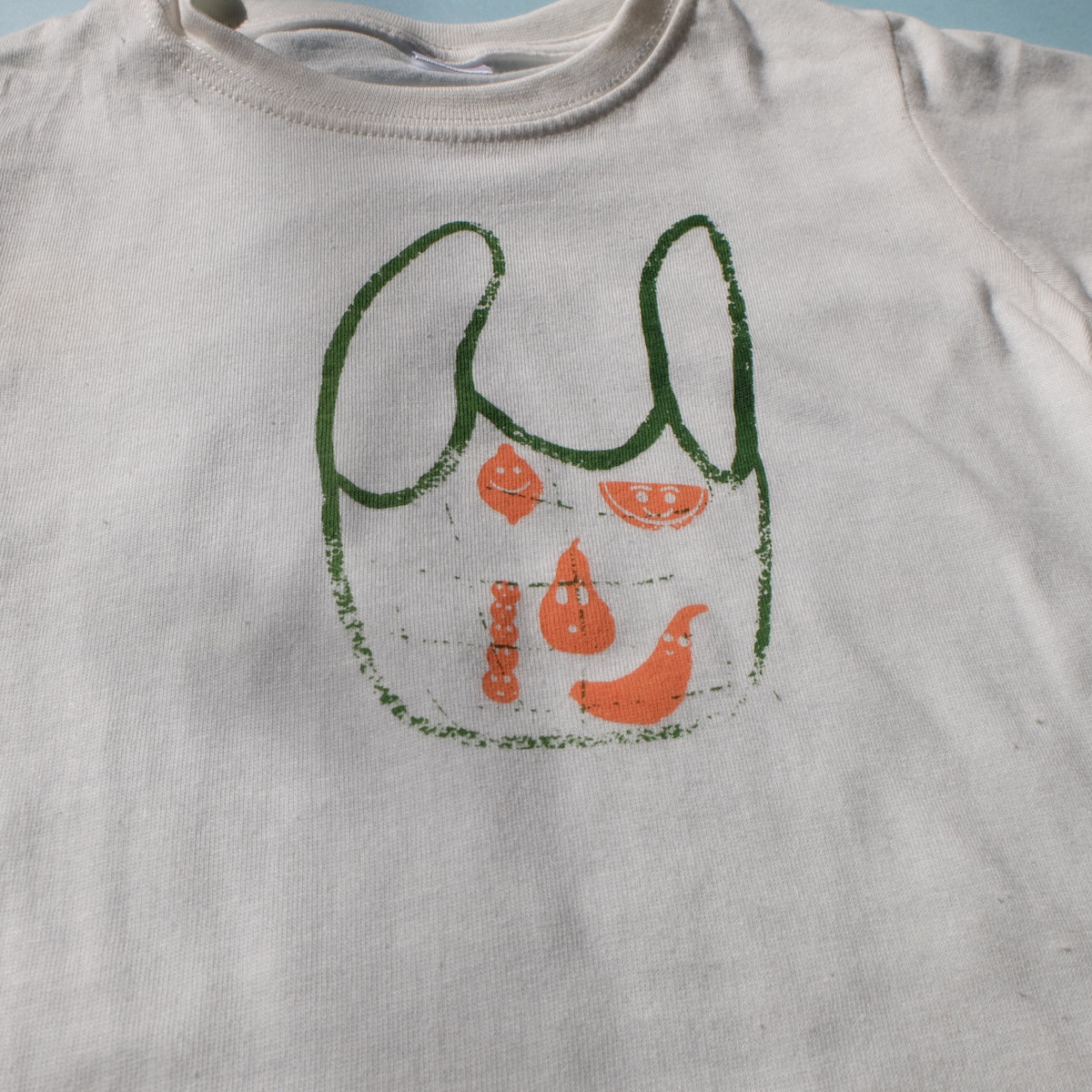 CAMISETA BOLSA